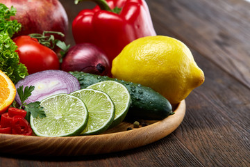 Bowl with oatmeal flakes served with fruits on wooden tray wooden background, flat lay, selective focus