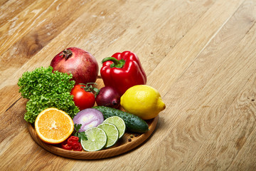 Bowl with oatmeal flakes served with fruits on wooden tray wooden background, flat lay, selective focus