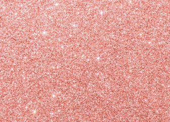 Rose gold glitter texture pink red sparkling shiny wrapping paper background for Christmas holiday...