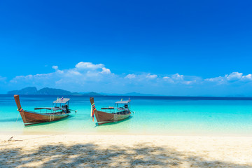 Fototapeta na wymiar longtail boat on the beach,south of Thailand Krabi,Trang