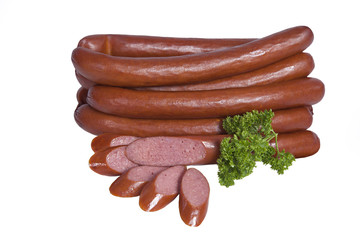 Long smoked sausages in a natural shell. Isolated on white background