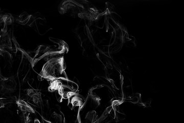 Movement of white smoke isolated on black background.