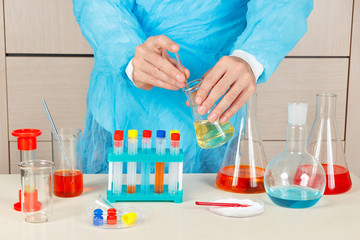 Researcher doing chemical experiments in the laboratory