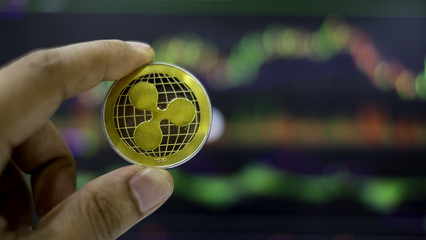 The gold ripple with trading graph background