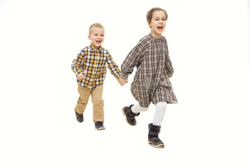 Images of children running on a white background