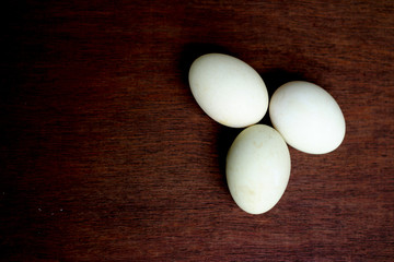 Eggs on wooden background