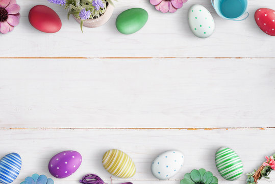 Easter background image with free space for text. Top view of white wooden surface.