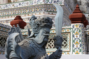 Giant Stone Chinese Guardians In Buddhist Temple Wat Arun Thailand 
