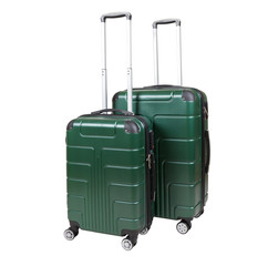 Green suitcase isolated on white background. Polycarbonate suitcase isolated on white. Green suitcase.