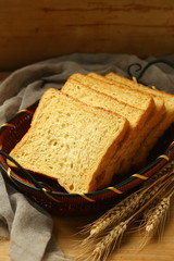whole wheat bread on wooden table