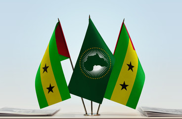 Two flags of Sao Tome and Principe and African Union flag between