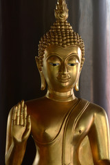 Golden of buddish state in the art style ,Wat Krathum Suea Pla temple ,Bangkok