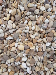 Piedras de colores, fondo. Textura de rocas. Papel pintado.