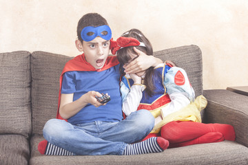 Little boy protects his sister from watching inappropriate content on TV