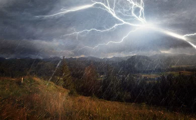 Poster de jardin Orage storm and rain over the mountains