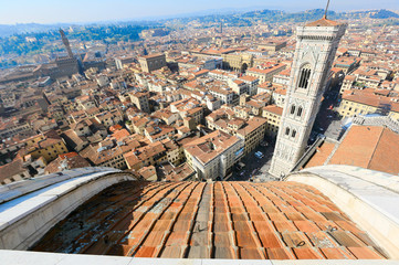 Fototapeta premium View of Giotto's Bell Tower From Top of Cathedral Santa Maria del Fiore in Firenze, Italy ~ Scenery of Florence Old Town from Cathedral of Saint Mary of the Flowers
