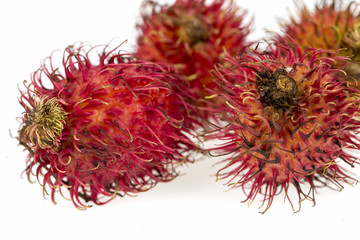 Rambutan fruit on a white background