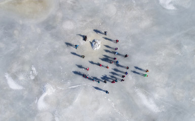 People on frozen lake