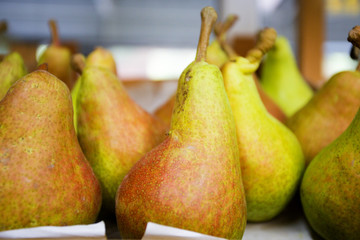 ripe juicy pear on the counter of the store