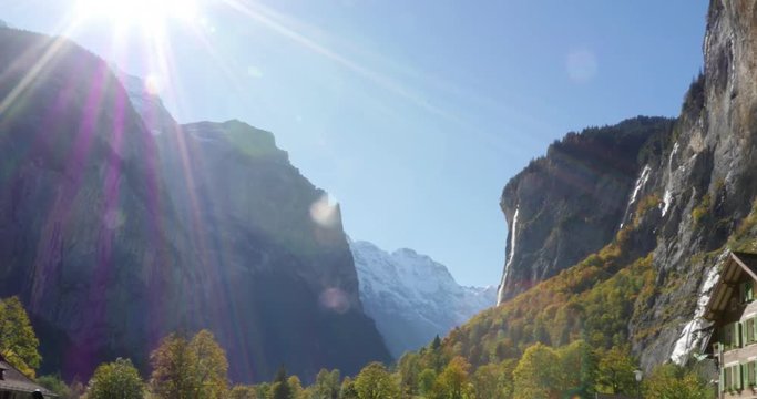 Mountain valley, Cinema 4k pan view of lauterbrunnen town and nature, in berner oberland, in the swiss alps of Switzerland