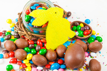 Fototapeta na wymiar Chocolate eggs and color candy glaze