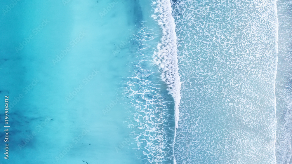 Wall mural wave on the beach as a background. beautiful natural background at the summer time