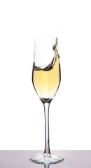 champagne in wineglass on white