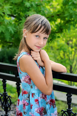 Naklejka premium Pretty girl posing outdoors