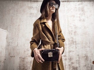 Stylish fashionable clothes and a young girl.
