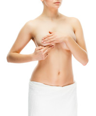 Woman examining breast isolated on white background
