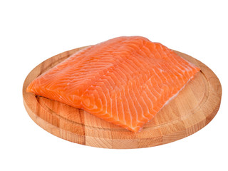 Fresh salmon fillet on wooden cutting board on white background, side view