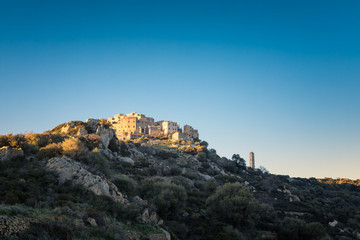 Fototapeta na wymiar Sant' Antonino church and village in Balagne region of Corsica