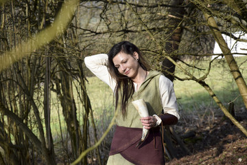 beautiful smiling celtic woman with drinking horn