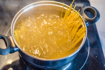 pot with boiling spaghetti