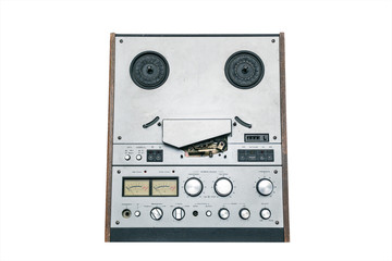 Fototapeta premium Old reel tape recorder isolated on a white background