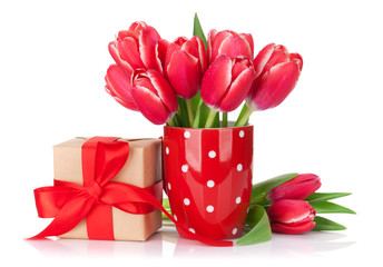 Red tulip flowers bouquet and gift box