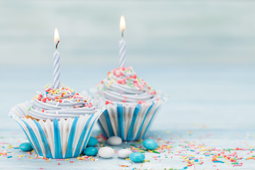 Sweet cupcakes with candles