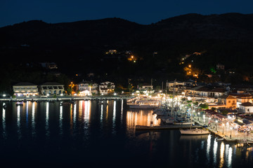 Fototapeta na wymiar Panorama of the center of the town of Sivota in Greece at night