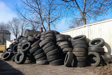 Pile of used rubber tyres