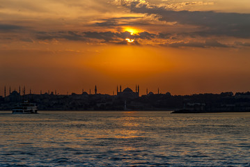 Naklejka premium Istanbul, Turkey, 17 June 2007: Silhouette of Istanbul at sunset