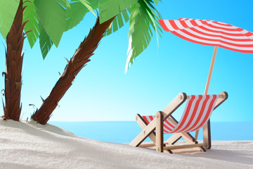 Tropical still life. Dawn on the sandy coast with palm trees. Sun lounger on the beach