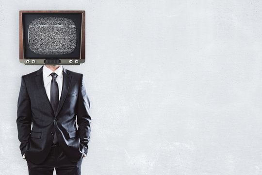 TV man on concrete background with copyspace