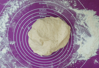pizza dough on the table close up