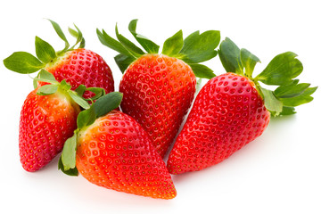 Fresh strawberries close up on white background.