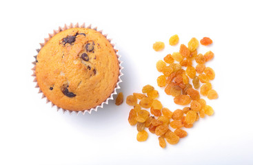 Delicious homemade cupcake with raisins and chocolate isolated on white background. Muffins. Top view.