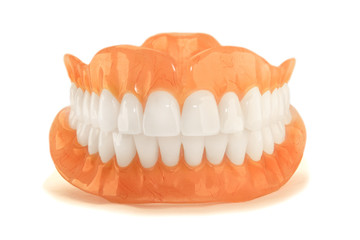 Close-up of plastic denture teeth isolate no fond background. New technologies in modern dentists.