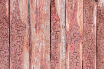 Old wooden fence with cracked paint