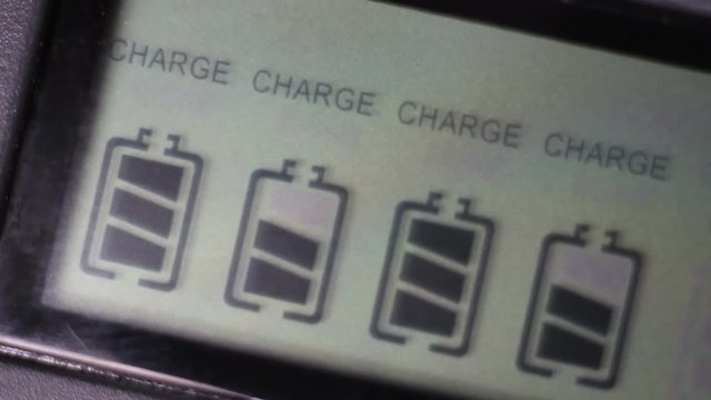 Charging the batteries, charger screen, closeup.