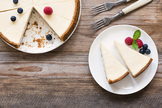 Classic New York Cheesecake On Rustic Wood, Top View and Copy Space For Text