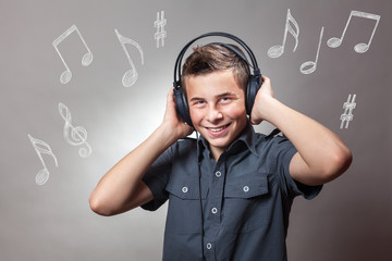 Young Boy  listening a music and singing